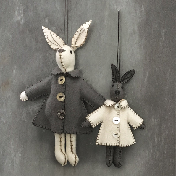 White rabbit with grey jacket - Emily